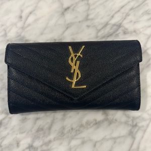 YSL Cassandre Large Flap Wallet Embossed Leather in black